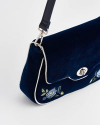 Rose Embroidered Blue Clutch