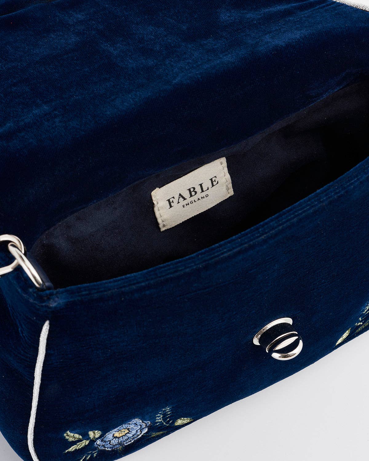 Rose Embroidered Blue Clutch